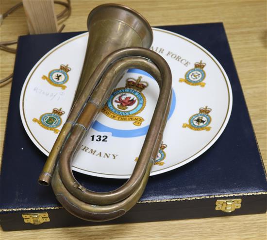 A Royal Airforce plate and a Saudi Air Force plate and a bugle